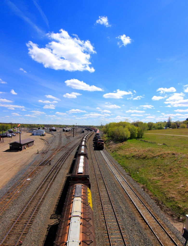 Train under the 1st Street Bridge