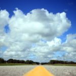 Blue sky above the highway