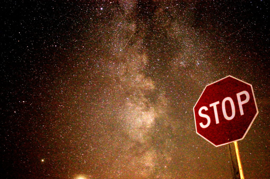 The Milky Way behind a stop sign