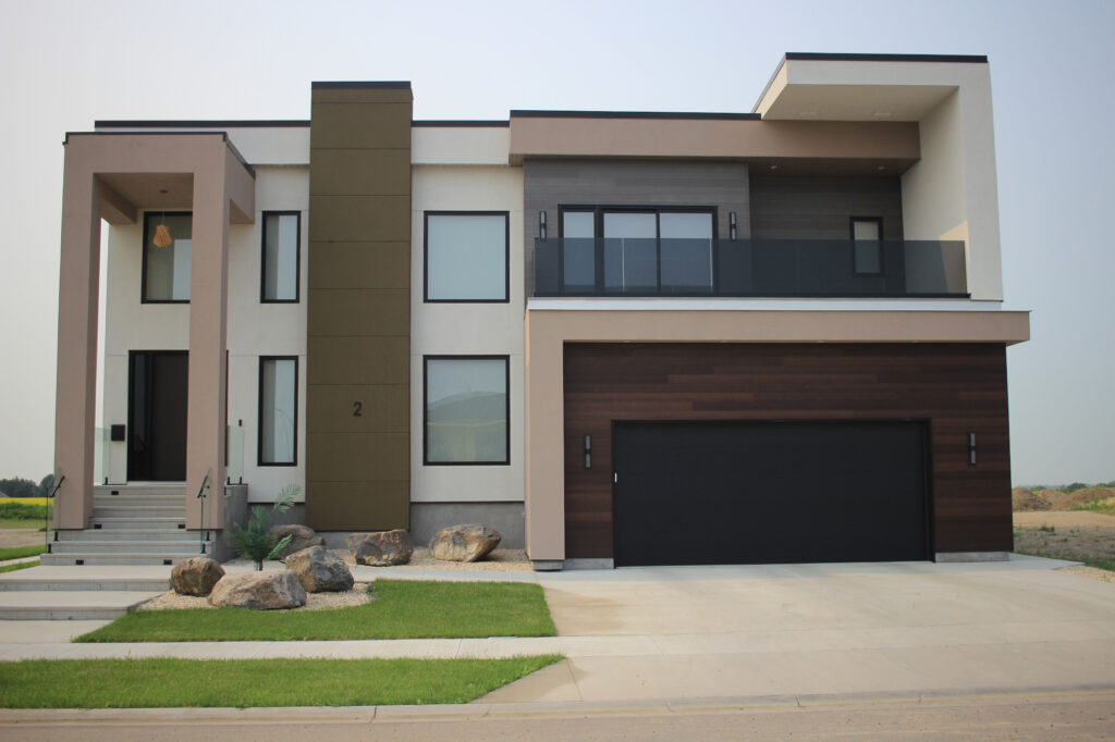A large house, mostly in earth-tone colours, made with very rectangular lines. Everything's a right angle.