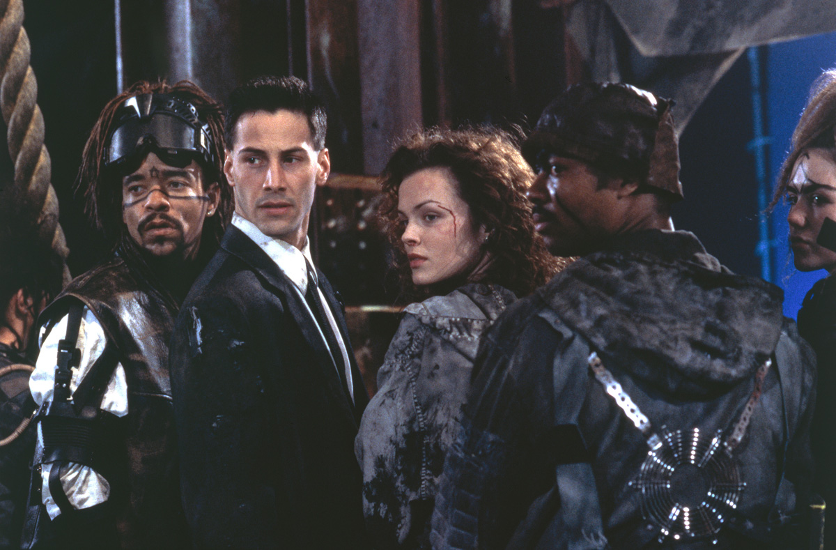 Screencap from Johnny Mnemonic, including Ice-T, Keanu Reeves, and Dina Meyer