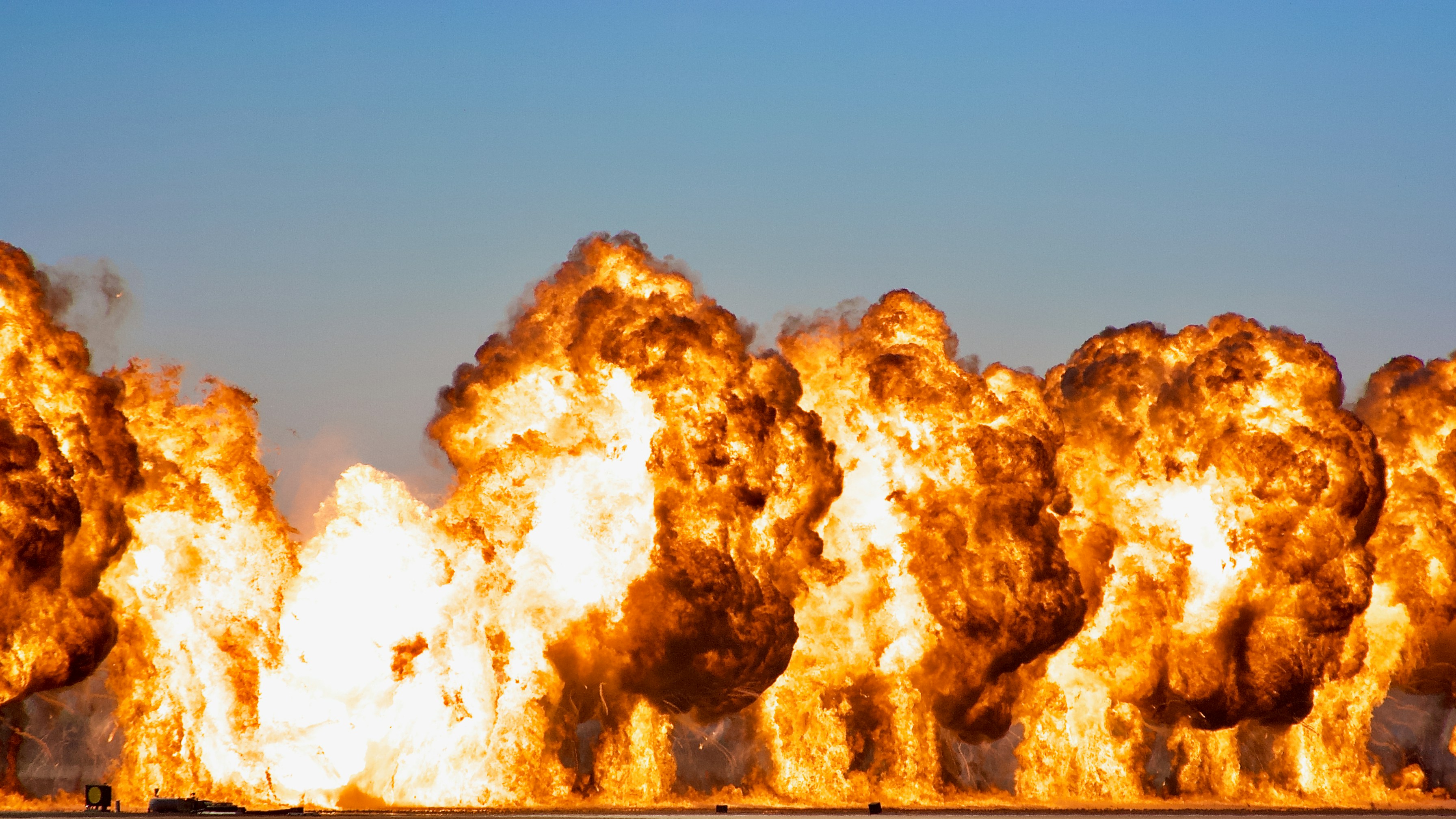 An image of several explosions all in a row