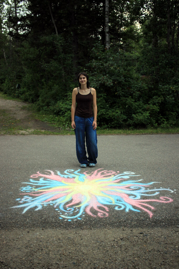 Gen and her sunburst chalk art